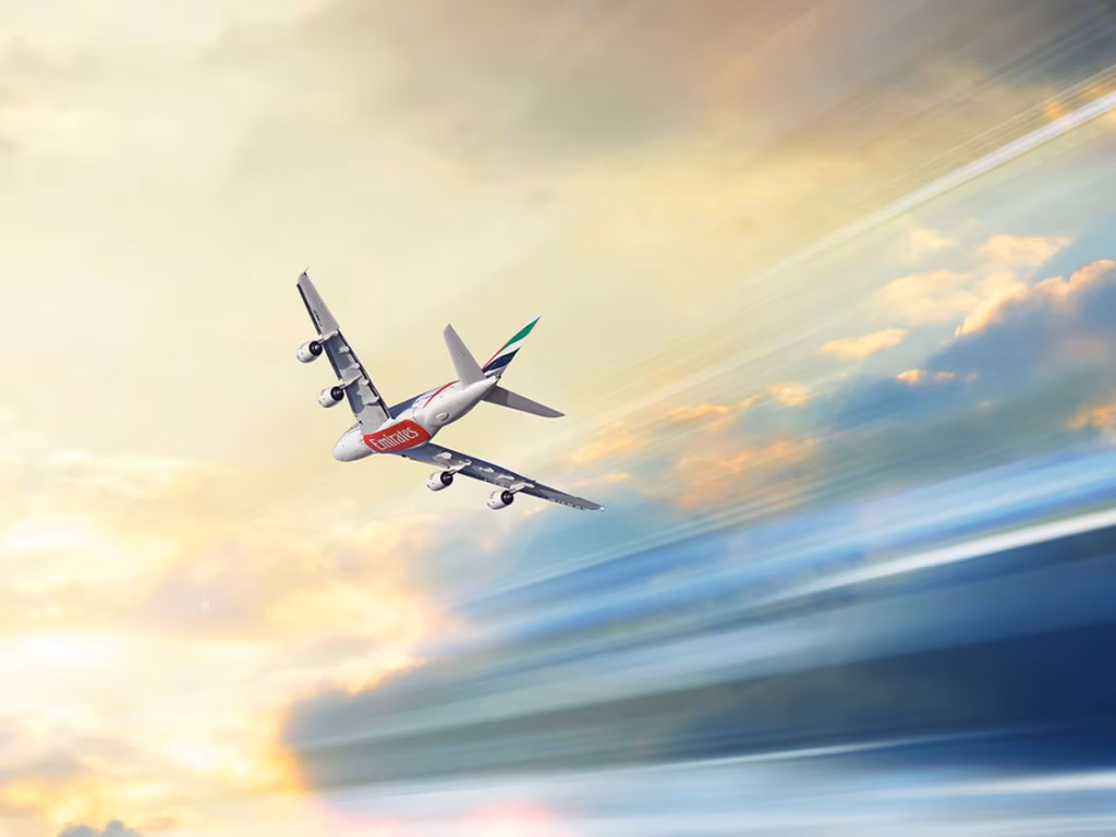emirates-airbus-a380-flying-above-dramatic-clouds-w1130x848