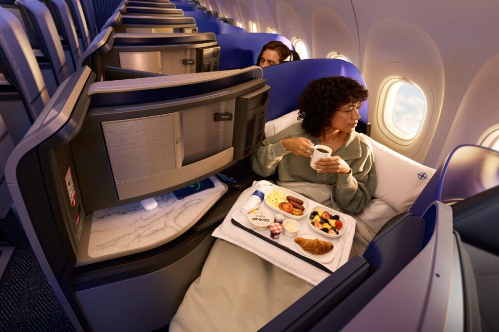United Polaris business class suite on the Airbus A321XLR with a lie-flat seat and meal service